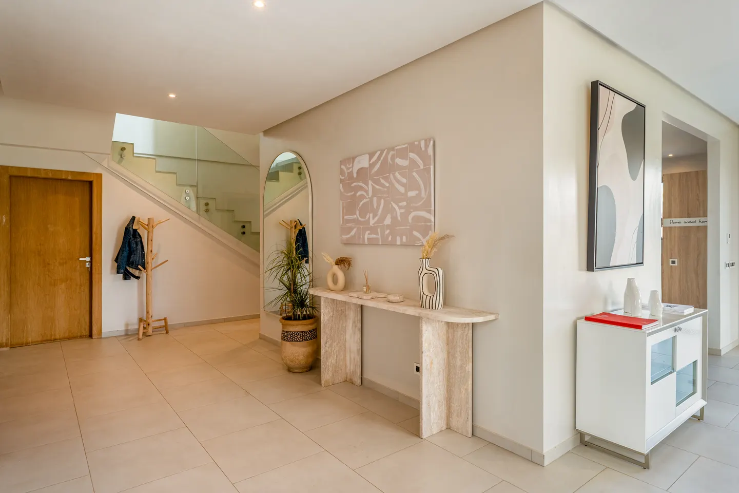 Entrance hall with console table and staircase