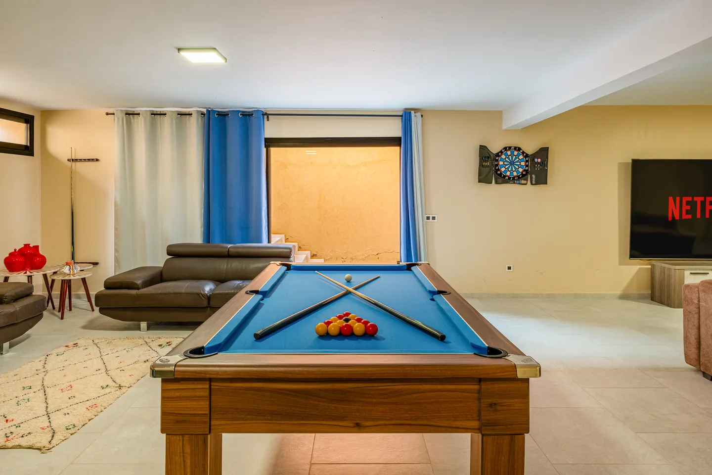 Games room with billiards table and lounge