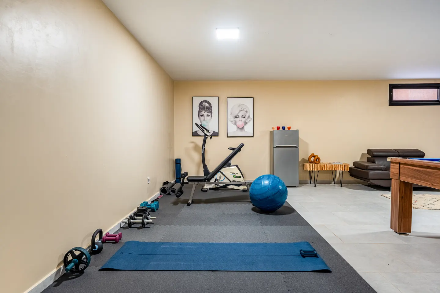 Fitness corner and games room in the basement