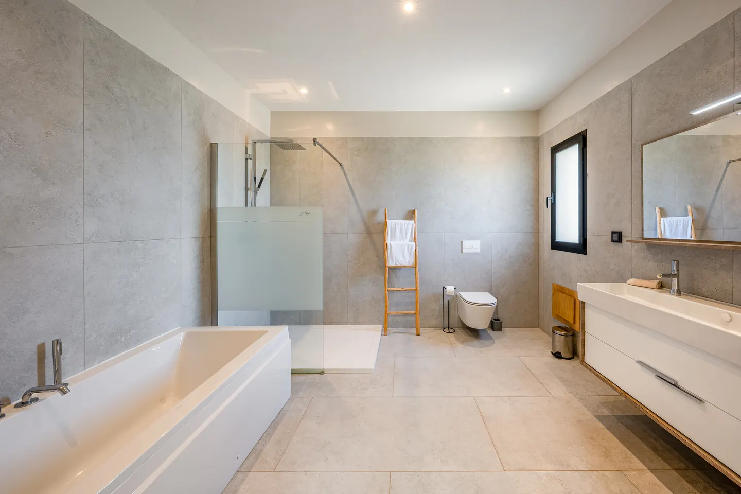 Bathroom with bathtub and separate shower